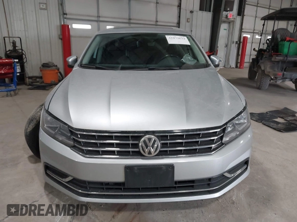 2016 Volkswagen Passat SE z VIN 1VWBT7A37GC027073, wystawiony jako IAAI lot #41073634 z przebiegiem 72 563 mil mil oraz . Historia ofert i sprzedaży dostępna na DreamBid. Obrazek 12.