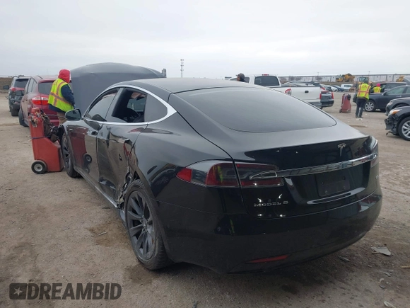 2018 Tesla Model S 75D with VIN 5YJSA1E22JF282828, listed as a IAAI auction lot 41595543 with 72,571 mi miles and . Bid and sale history available at DreamBid. Image 3.