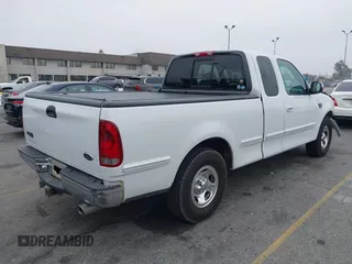 2000 Ford F-150 XL with VIN 1FTRX17L4YNA39407, listed as a IAAI auction lot 42141350 with 82,824 mi miles and . Bid and sale history available at DreamBid. Image 4.