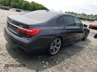 2016 BMW 7 Series 750i xDrive with VIN WBA7F2C5XGG418225, listed as a Copart auction lot 54860623 with 76,980 mi miles and . Bid and sale history available at DreamBid. Image 3.