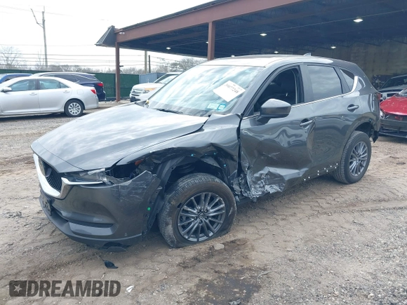 2021 Mazda CX-5 Touring with VIN JM3KFBCM8M0492145, listed as a IAAI auction lot 39077248 with 20,408 mi miles. Bid and sale history available at carsss.com. Image 18.