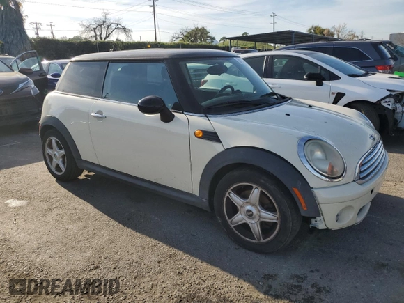 2010 MINI Hardtop with VIN WMWMF3C52ATZ65593, listed as a Copart auction lot 50107445 with 105,389 mi miles and Salvage title. Bid and sale history available at DreamBid. Image 4.