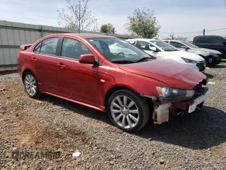 2009 Mitsubishi Lancer with VIN JA3AU86W09U034186, listed as a Copart auction lot 54118385 with 113,346 mi miles and Salvage Title. Bid and sale history available at DreamBid. Image 4.