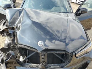 2022 BMW X5 M z VIN 5YMJU0C02N9N01549, wystawiony jako Copart lot #55514093 z przebiegiem Nie podano mil oraz . Historia ofert i sprzedaży dostępna na DreamBid. Obrazek 13.