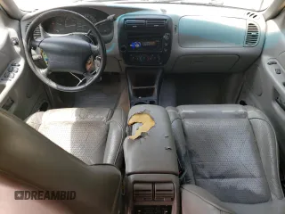1997 Ford Explorer XL with VIN 1FMDU32E8VUC60285, listed as a Copart auction lot 66154644 with 219,066 mi miles and Salvage title. Bid and sale history available at DreamBid. Image 8.