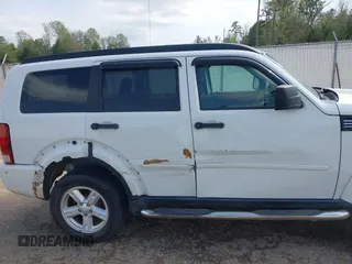 2008 Dodge Nitro SXT with VIN 1D8GU28K18W129119, listed as a IAAI auction lot 41899314 with 244,830 mi miles. Bid and sale history available at carsss.com. Image 14.