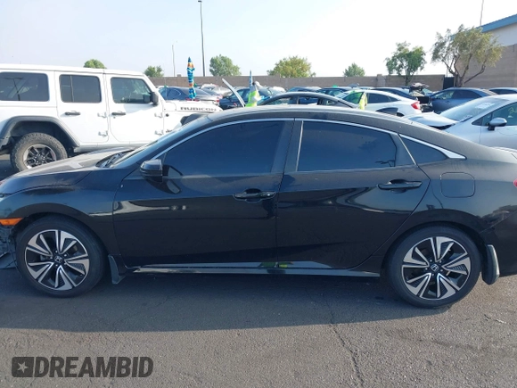 2016 Honda Civic EX-L with VIN 2HGFC1F79GH659164, listed as a IAAI auction lot 42455097 with 166,157 mi miles and . Bid and sale history available at DreamBid. Image 14.