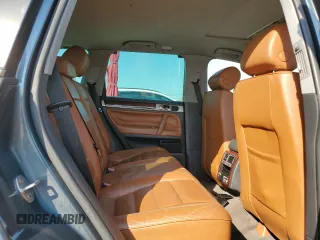 2005 Volkswagen Touareg 4.2L V8 z VIN WVGZM77L55D061960, wystawiony jako Copart lot #75717614 z przebiegiem 188 101 mil mil oraz Szkoda całkowita • Salvage title. Historia ofert i sprzedaży dostępna na DreamBid. Obrazek 11.