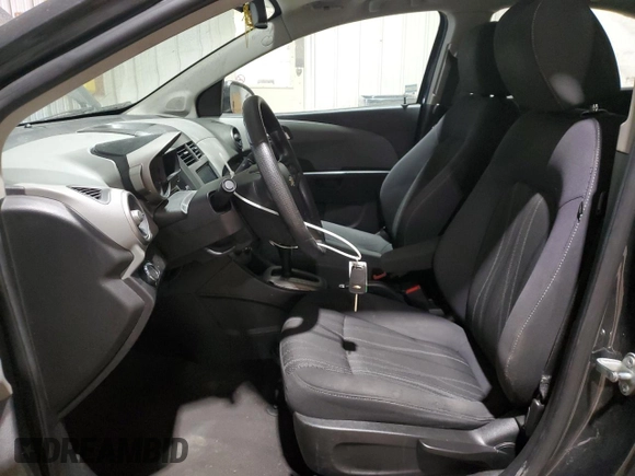 2014 Chevrolet Sonic LT with VIN 1G1JC5SH4E4239958, listed as a Copart auction lot 46082295 with 128,275 mi miles and Salvage Title. Bid and sale history available at DreamBid. Image 7.