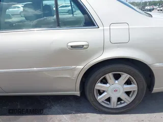 2008 Cadillac DTS 1SC with VIN 1G6KD57Y38U100381, listed as a IAAI auction lot 42173059 with 146,669 mi miles and . Bid and sale history available at carsss.com. Image 14.