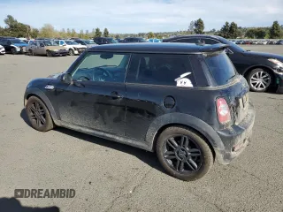 2012 MINI Hardtop S with VIN WMWSV3C54CT386098, listed as a Copart auction lot 52742075 with 119,432 mi miles and Salvage Title. Bid and sale history available at DreamBid. Image 2.