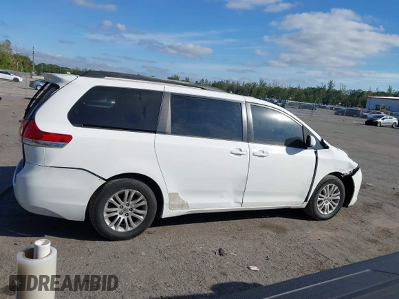 2012 Toyota Sienna XLE AAS with VIN 5TDYK3DC0CS254294, listed as a IAAI auction lot 41274822 with 135,135 mi miles and . Bid and sale history available at carsss.com. Image 14.