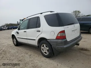 1999 Mercedes-Benz M-Class with VIN 4JGAB54E2XA061500, listed as a Copart auction lot 51301525 with 191,463 mi miles and Salvage Title. Bid and sale history available at carsss.com. Image 2.