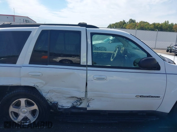 2004 Chevrolet TrailBlazer LS with VIN 1GNDT13S842389970, listed as a IAAI auction lot 40377507 with 178,488 mi miles and . Bid and sale history available at DreamBid. Image 14.