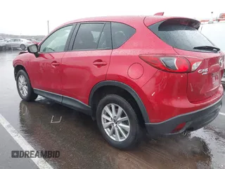 2015 Mazda CX-5 Touring with VIN JM3KE4CY3F0529669, listed as a IAAI auction lot 41866873 with 137,635 mi miles and . Bid and sale history available at carsss.com. Image 3.