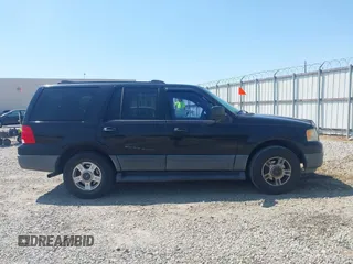 2003 Ford Expedition XLT Value z VIN 1FMPU16W63LA50775, wystawiony jako IAAI lot #42029150 z przebiegiem 296 065 mil mil oraz . Historia ofert i sprzedaży dostępna na DreamBid. Obrazek 13.