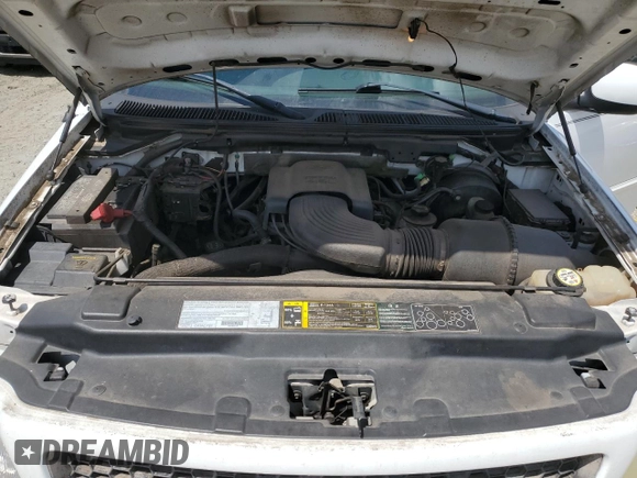 2003 Ford F-150 XL with VIN 1FTRF17W83NA54398, listed as a Copart auction lot 58680304 with 164,874 mi miles and Salvage Title. Bid and sale history available at DreamBid. Image 11.