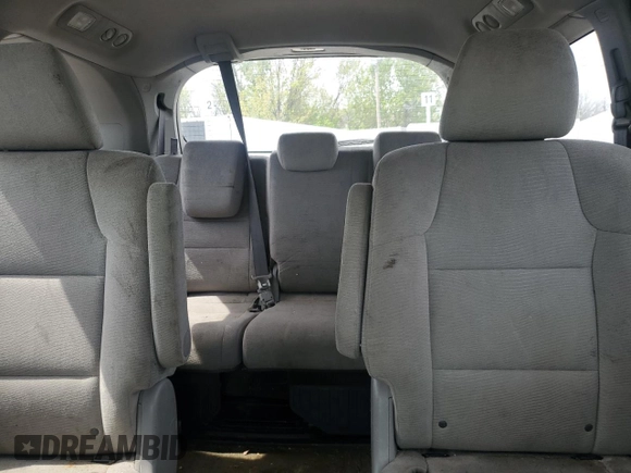 2013 Honda Odyssey LX z VIN 5FNRL5H28DB085114, wystawiony jako Copart lot #52942495 z przebiegiem 158 191 mil mil oraz Szkoda całkowita • Salvage title. Historia ofert i sprzedaży dostępna na DreamBid. Obrazek 10.