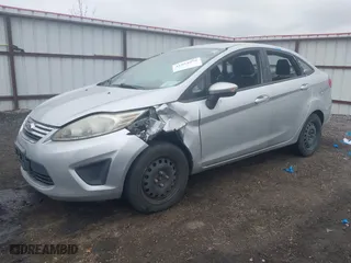 2013 Ford Fiesta SE with VIN 3FADP4BJ3DM176706, listed as a IAAI auction lot 42047063 with 126,799 mi miles. Bid and sale history available at carsss.com. Image 2.