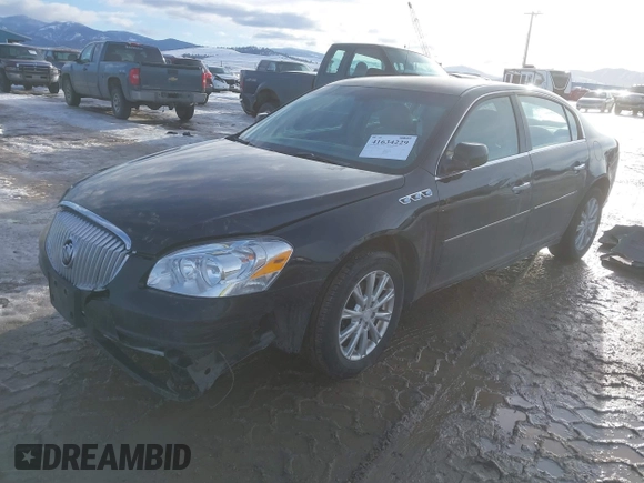 2011 Buick Lucerne CXL with VIN 1G4HC5EM1BU150452, listed as a IAAI auction lot 41634229 with 295,813 mi miles and . Bid and sale history available at carsss.com. Image 2.