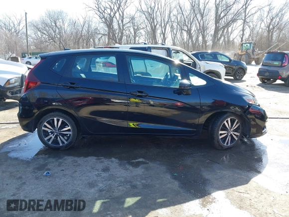 2019 Honda Fit EX z VIN 3HGGK5H86KM716757, wystawiony jako IAAI lot #41749738 z przebiegiem 89 132 mil mil oraz . Historia ofert i sprzedaży dostępna na DreamBid. Obrazek 13.