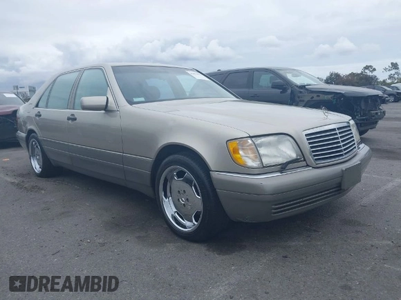 1996 Mercedes-Benz S with VIN WDBGA57E8TA318326, listed as a IAAI auction lot 42072979 with 97,504 mi miles and . Bid and sale history available at DreamBid. Image 1.