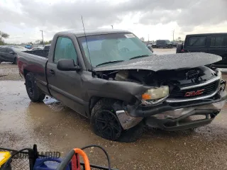 2000 GMC New Sierra 1500 SL with VIN 1GTEC14WXYZ137942, listed as a Copart auction lot 79333014 with 205,229 mi miles and Salvage Title. Bid and sale history available at carsss.com. Image 4.