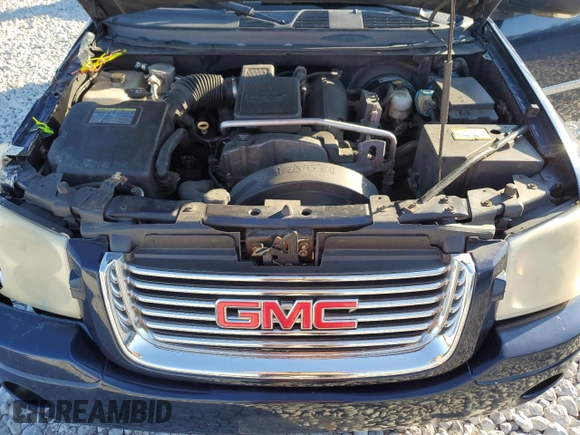 2008 GMC Envoy SLE2 with VIN 1GKDT13S882100069, listed as a Copart auction lot 77164634 with 206,709 mi miles and Salvage Title. Bid and sale history available at DreamBid. Image 12.