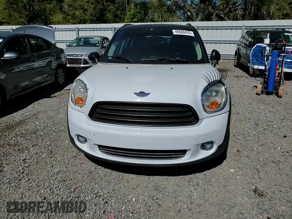 2011 MINI Countryman with VIN WMWZB3C56BWM00040, listed as a Copart auction lot 48660435 with 146,607 mi miles and Salvage title. Bid and sale history available at DreamBid. Image 12.