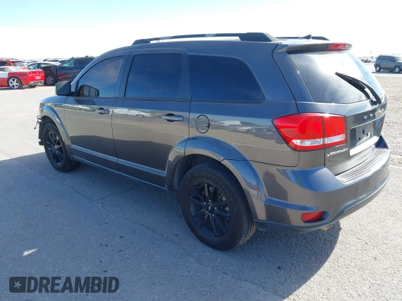 2019 Dodge Journey SE with VIN 3C4PDCBG7KT872888, listed as a IAAI auction lot 41390094 with 114,513 mi miles and . Bid and sale history available at DreamBid. Image 3.