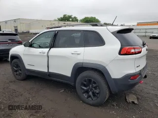 2015 Jeep Cherokee Trailhawk with VIN 1C4PJMBS6FW680963, listed as a Copart auction lot 61306385 with 174,793 mi miles and Clean title. Bid and sale history available at DreamBid. Image 2.