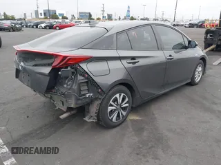 2017 Toyota Prius Plus with VIN JTDKARFP6H3058607, listed as a IAAI auction lot 42074537 with 181,991 mi miles and . Bid and sale history available at DreamBid. Image 4.