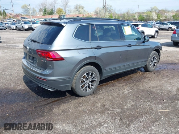 2019 Volkswagen Tiguan SE with VIN 3VV2B7AX5KM198454, listed as a IAAI auction lot 42033410 with 64,381 mi miles and . Bid and sale history available at DreamBid. Image 4.