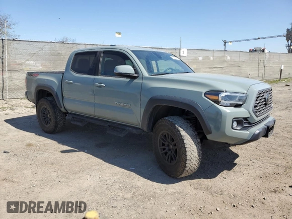 2022 Toyota Tacoma SR z VIN 3TMCZ5AN5NM506941, wystawiony jako Copart lot #52349755 z przebiegiem 46 013 mil mil oraz Szkoda całkowita • Salvage title. Historia ofert i sprzedaży dostępna na DreamBid. Obrazek 4.