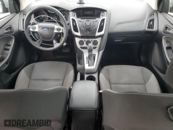 2012 Ford Focus SE with VIN 1FAHP3F2XCL202510, listed as a Copart auction lot 64066545 with 77,828 mi miles and Salvage title. Bid and sale history available at DreamBid. Image 8.