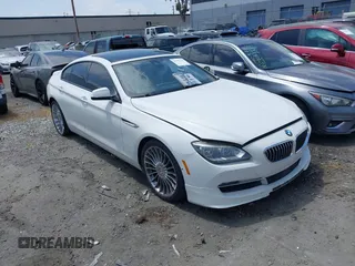 2015 BMW 6 Series 650i xDrive with VIN WBA6B4C53FD899938, listed as a IAAI auction lot 41761114 with 93,015 mi miles and . Bid and sale history available at carsss.com. Image 1.