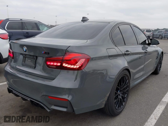 2018 BMW M3 z VIN WBS8M9C54J5K99251, wystawiony jako IAAI lot #38433789 z przebiegiem 41 081 mil mil oraz . Historia ofert i sprzedaży dostępna na DreamBid. Obrazek 4.