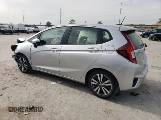 2016 Honda Fit EX-L with VIN JHMGK5H94GS015414, listed as a Copart auction lot 42038725 with 6,728 mi miles and Salvage title. Bid and sale history available at DreamBid. Image 2.