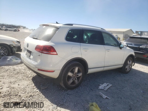 2012 Volkswagen Touareg Sport z VIN WVGFK9BP5CD000233, wystawiony jako Copart lot #46517515 z przebiegiem 198 242 mil mil oraz Szkoda całkowita • Salvage title. Historia ofert i sprzedaży dostępna na DreamBid. Obrazek 3.