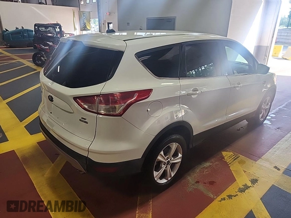 2014 Ford Escape SE z VIN 1FMCU9GX7EUC02600, wystawiony jako IAAI lot #42570755 z przebiegiem 86 871 mil mil oraz . Historia ofert i sprzedaży dostępna na DreamBid. Obrazek 18.