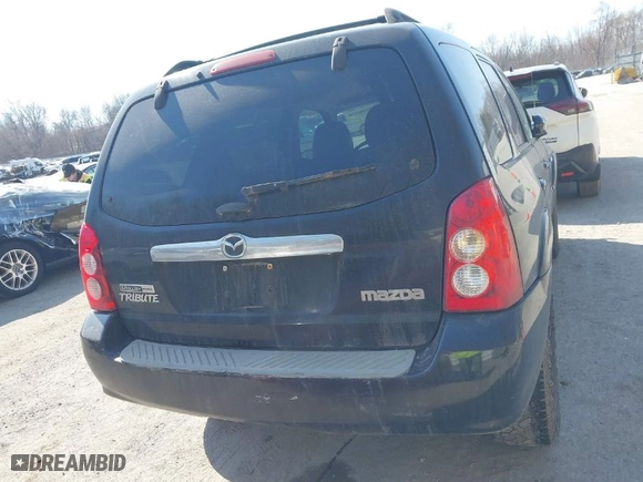 2005 Mazda Tribute s with VIN 4F2YZ06165KM39949, listed as a IAAI auction lot 41796476 with 270,492 mi miles. Bid and sale history available at carsss.com. Image 16.