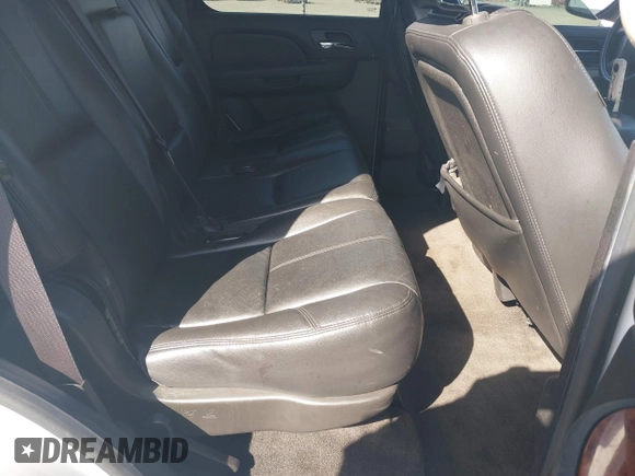 2014 Chevrolet Tahoe LT with VIN 1GNSCBE06ER233105, listed as a IAAI auction lot 41753190 with 161,056 mi miles and . Bid and sale history available at DreamBid. Image 8.