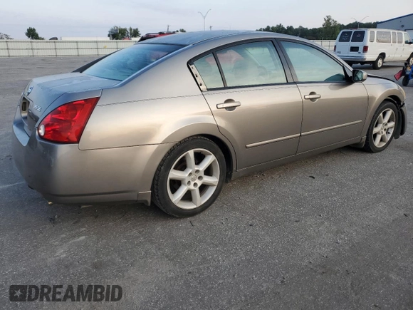 2004 Nissan Maxima SE with VIN 1N4BA41E24C878448, listed as a Copart auction lot 72596984 with 329,525 mi miles and Salvage Title. Bid and sale history available at carsss.com. Image 3.