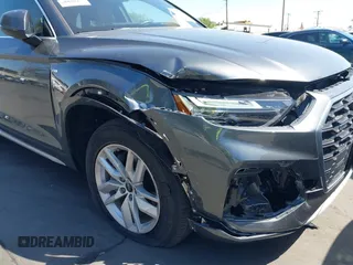 2022 Audi Q5 S line Premium z VIN WA1GAAFY3N2088773, wystawiony jako IAAI lot #41969990 z przebiegiem 22 922 mil mil oraz . Historia ofert i sprzedaży dostępna na DreamBid. Obrazek 6.