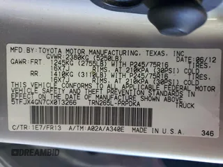 2012 Toyota Tacoma PreRunner with VIN 5TFJX4GN7CX013266, listed as a Copart auction lot 57114145 with 229,522 mi miles and Clean title. Bid and sale history available at DreamBid. Image 12.