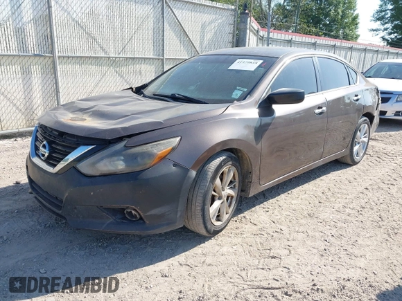 2015 Nissan Altima 2.5 S with VIN 1N4AL3AP3FC430613, listed as a IAAI auction lot 41979818 with 186,921 mi miles. Bid and sale history available at carsss.com. Image 2.