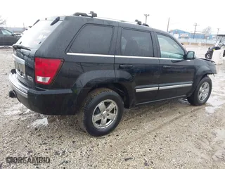 2006 Jeep Grand Cherokee Overland with VIN 1J8HR68296C308382, listed as a IAAI auction lot 41466673 with 167,028 mi miles. Bid and sale history available at carsss.com. Image 4.