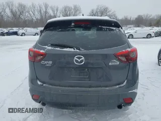 2016 Mazda CX-5 Grand Touring with VIN JM3KE4DY2G0913412, listed as a IAAI auction lot 41616132 with 85,166 mi miles. Bid and sale history available at carsss.com. Image 16.