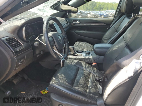 2020 Jeep Grand Cherokee High Altitude with VIN 1C4RJFCG6LC346735, listed as a Copart auction lot 64877935 with 50,258 mi miles and Salvage title. Bid and sale history available at DreamBid. Image 7.