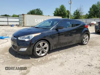 2013 Hyundai Veloster w/Black Int z VIN KMHTC6AD3DU171389, wystawiony jako Copart lot #57343135 z przebiegiem 80 572 mil mil oraz Szkoda całkowita • Salvage title. Historia ofert i sprzedaży dostępna na DreamBid. Obrazek 1.
